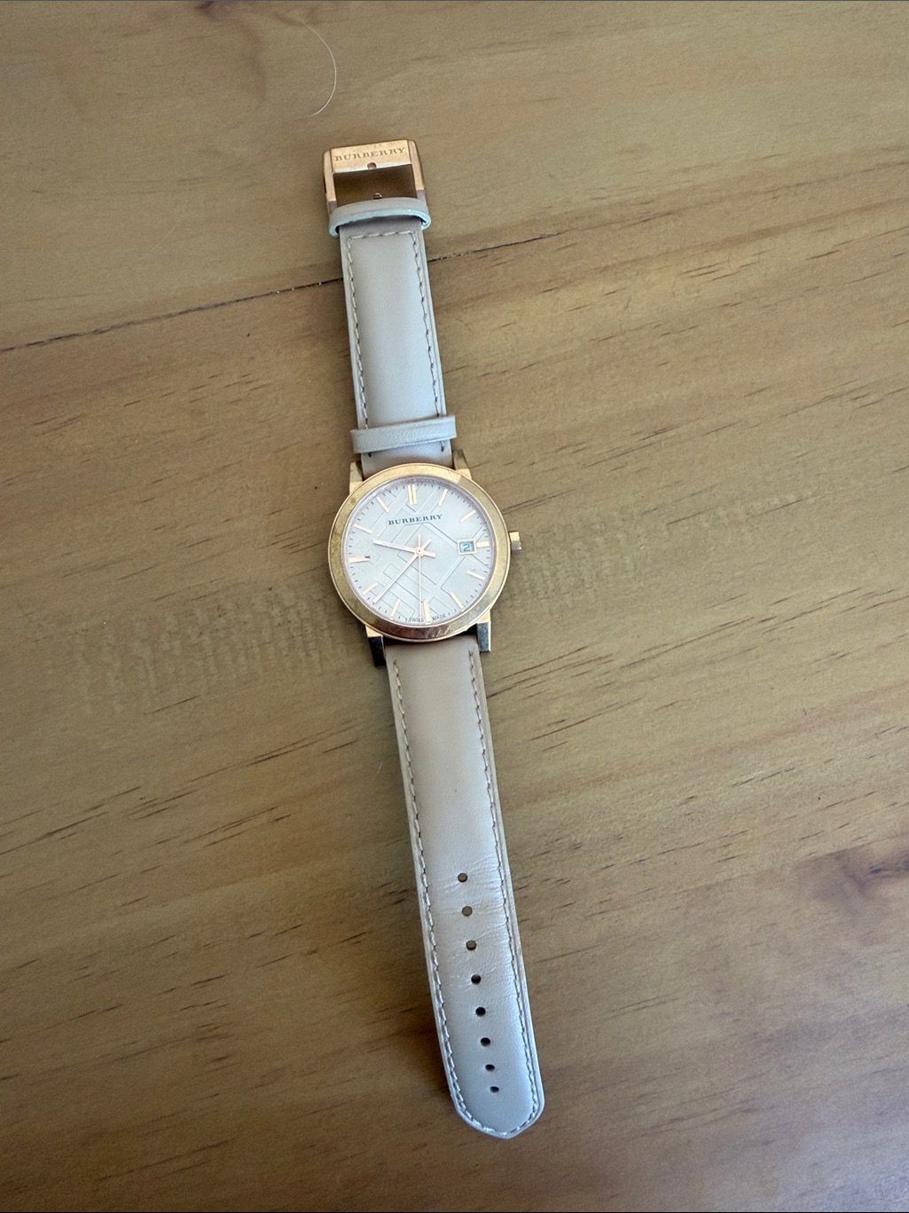Burberry Beige Leather Strap Watch With Gold Case And Cream Dial